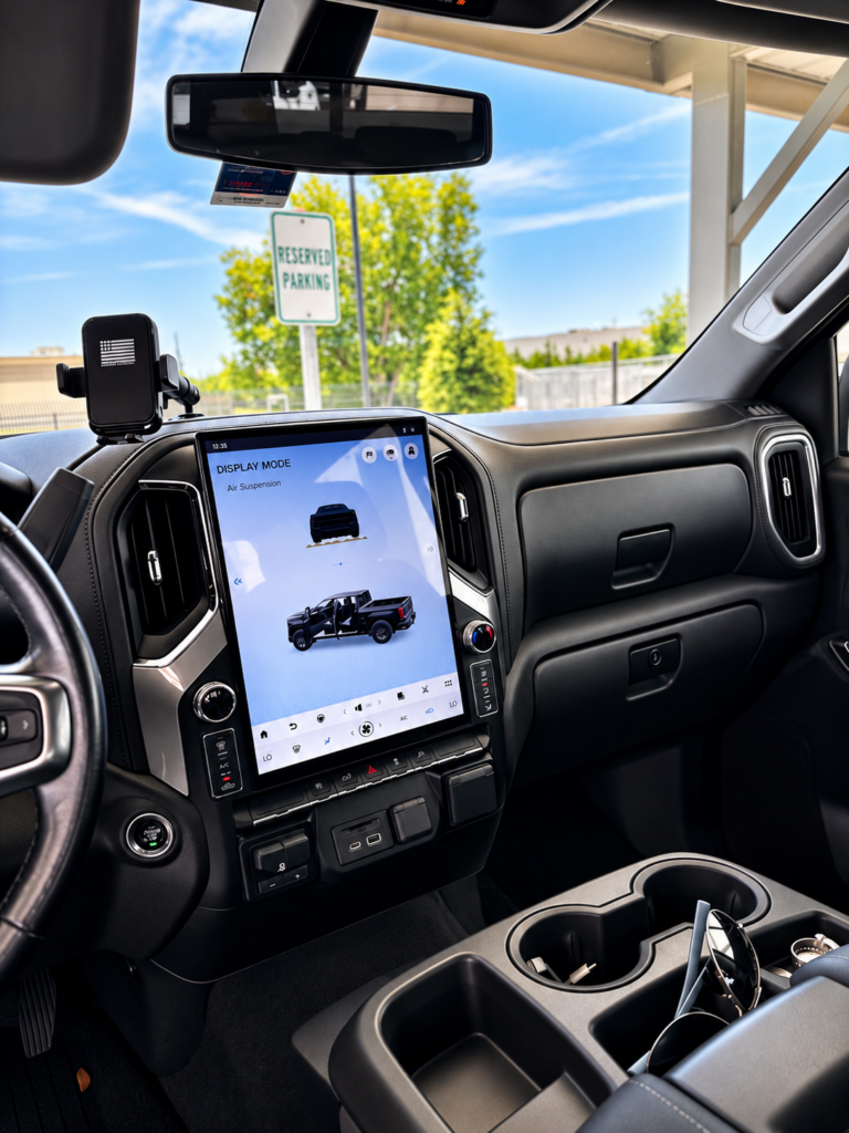 Aftermarket vertical touchscreen radio installed in a vehicle dashboard for an infotainment system upgrade